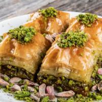 Pistachio Baklava · Traditional flaky dough flavored with honey and pistachios.