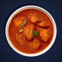 Chicken Curry Clues  · Free range chicken breast in a tomato based onion gravy with freshly ground spices.