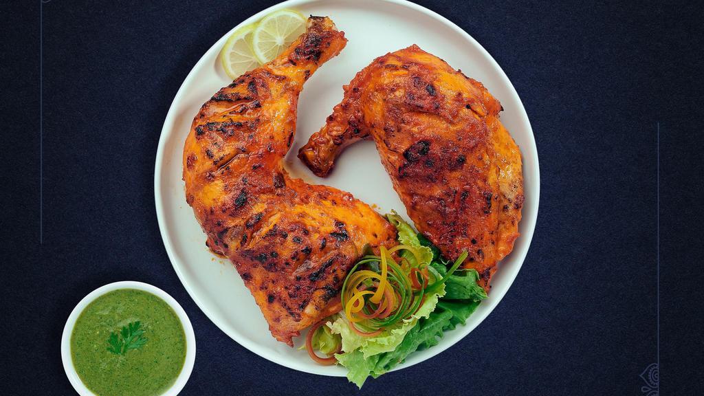 Chicken Tandoori Tandem  · Juicy chicken dipped in a yoghurt & ground spice marinated and baked in a tandoor clay oven.