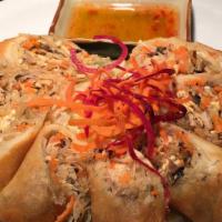 J1 Imperial Rolls · Deep-fried rolls wrapped with vegetables, taro, and bean thread noodle.