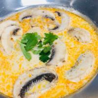 J15 Tom Kha Soup · Spicy coconut milk soup with lemongrass, galanga, mushroom, lemon juice, and coconut milk.