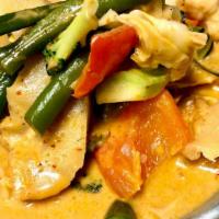 J41 Yellow Curry · A mild curry with mixed veggies and tofu, turmeric fresh herbs, spices, coconut milk, and po...