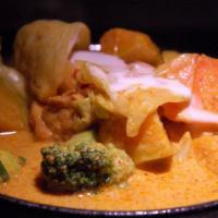J42 Kabocha Squash Curry  · Kabocha squash simmered with mild yellow curry, tofu, carrot, and coconut milk.
