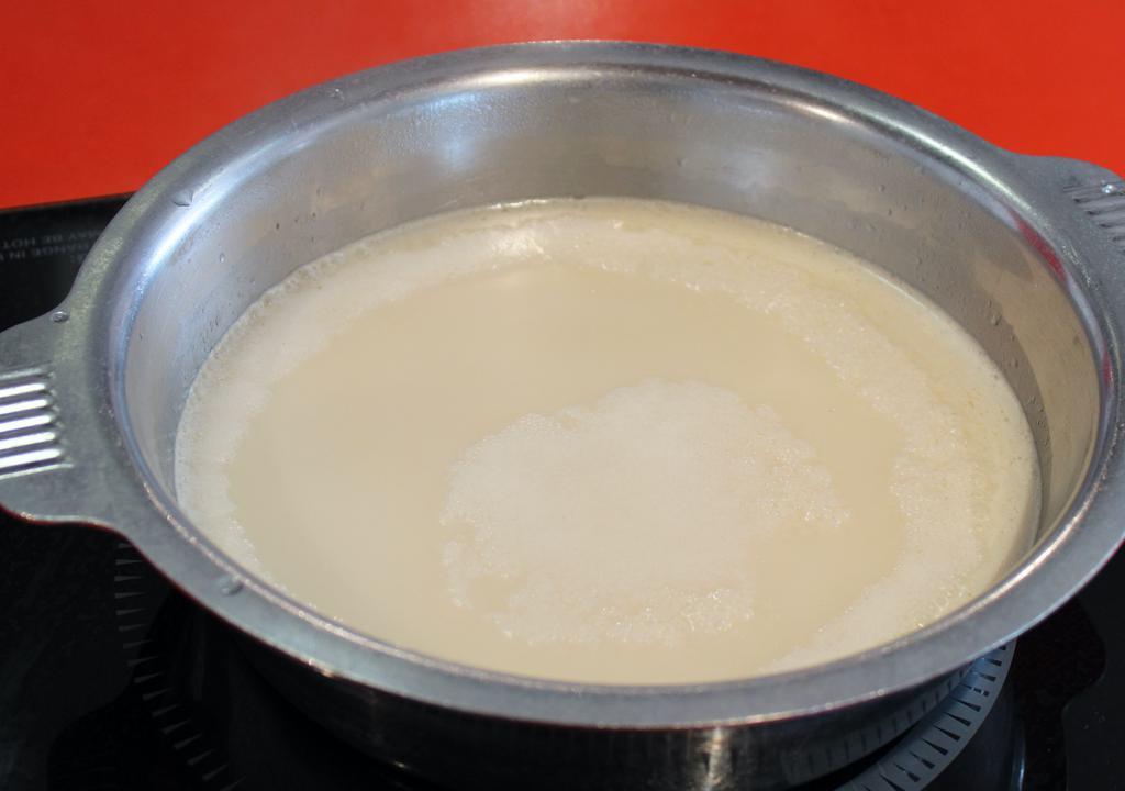 Tonkotsu Broth · Rich pork bone soup seasoned with soy sauce.  *it has an additional cost per 1 pot.