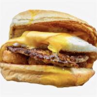 Sausage, Egg, Cheese, & Potatoes Smashed Sammy · Breakfast sandwich with fried egg, chicken sausage, and potatoes.