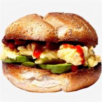 Veggie Egg, Cheese & Avocado Smashed Sammy · Breakfast sandwich with scrambled eggs, cheese, caramelized onions, tomato, and avocado.