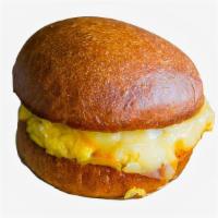 Simple Smashed Sammy · Breakfast sandwich with scrambled eggs and cheese.