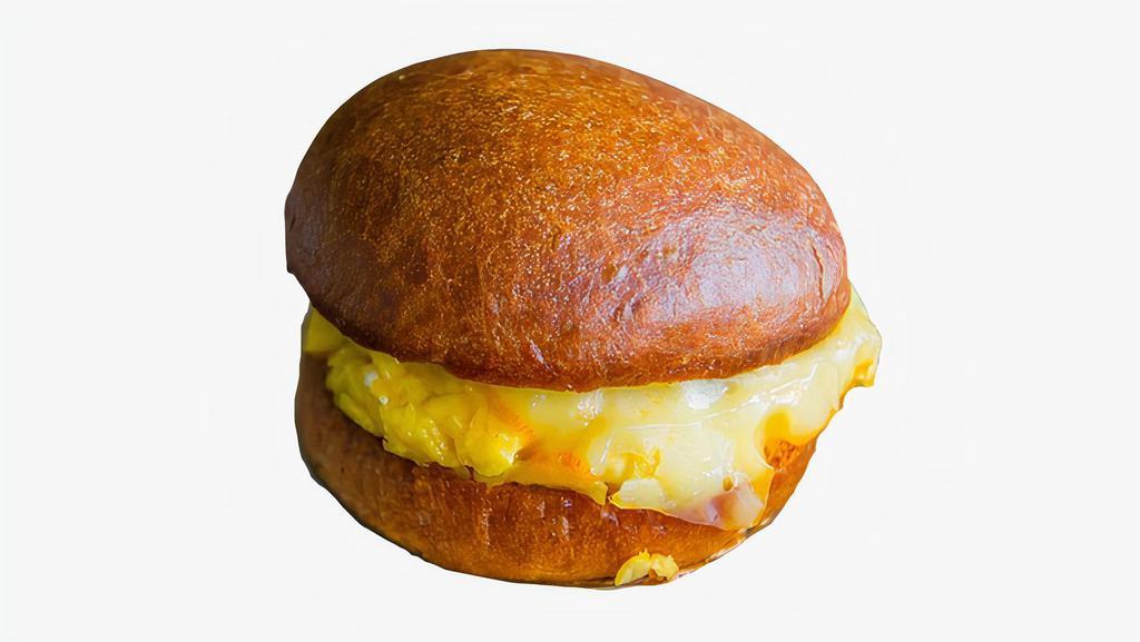 Simple Smashed Sammy · Breakfast sandwich with scrambled eggs and cheese.