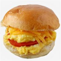 Veggie, Egg & Cheese Smashed Sammy · Breakfast sandwich with scrambled eggs, cheese, caramelized onions and tomato.