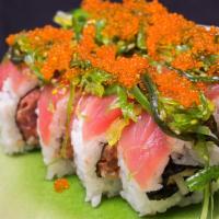 Brian's Roll · Spicy. Inside: spicy tuna and cucumber; outside: tuna, seaweed salad and tobiko.