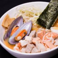 Seafood Ramen · Spicy miso ramen with seafood + two pc sushi.