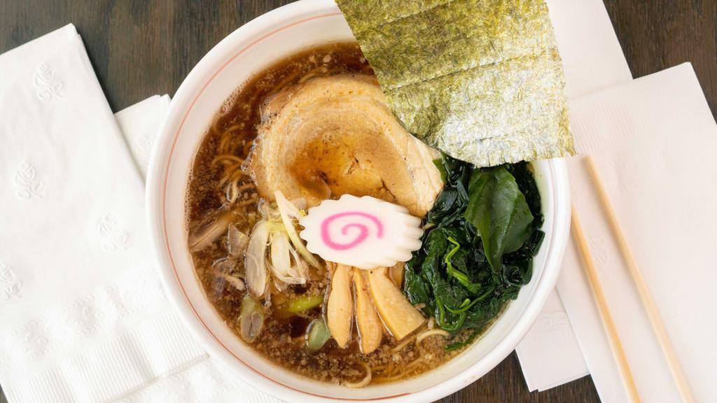 Shoyu Ramen (Soy Sauce Base) · Pork, Tokyo negi, bamboo shoots, fish cake, wakame seaweed, spinach, and nori seaweed.