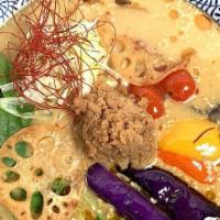Vegan Curry Tantan Ramen · Veggie Spicy Curry TanTan Soup with Vegan Noodle.
Topped with Eggplant, Bell Pepper, Tokyo N...
