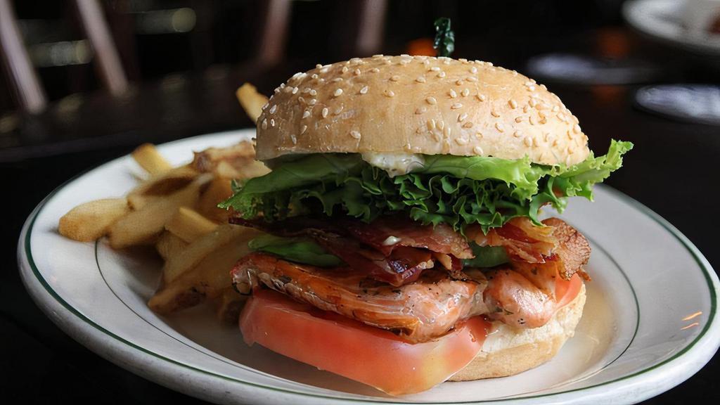 Grilled Salmon BLT · Grilled salmon, double applewood smoked bacon, avocado, mixed greens, tomato, lemon dill aioli, soft roll.