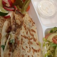 Quesadilla · This Quesadilla is not cheesy it's just the way it needs to be.  A cheesy meltdown in other ...