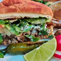 Tortas · A flavorful sandwich. Your choice of meat on a lettuce bed, tomato, avocado, cheese, sour cr...
