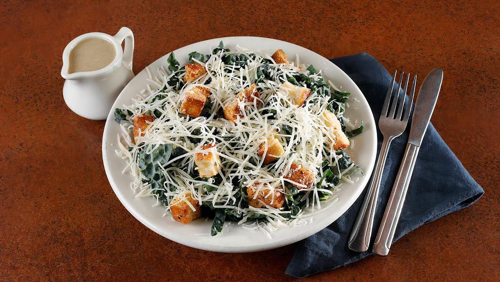 Kale Caesar · Kale, housemade croutons, freshly grated Parmesan. Served with Caesar dressing.