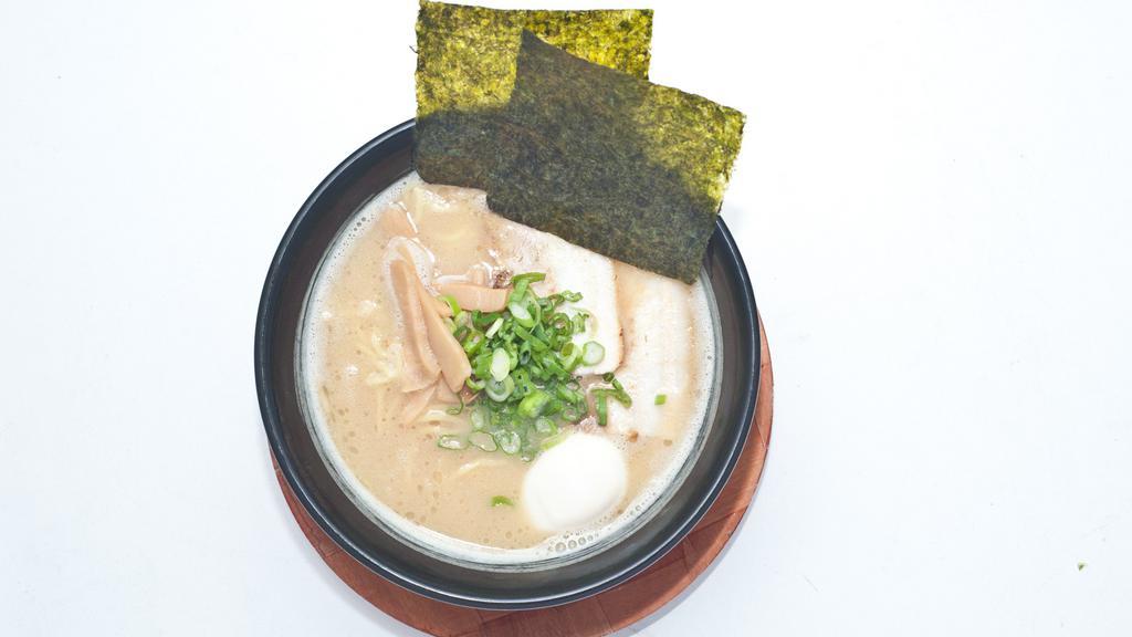Tonkotsu Shoyu Ramen · Thick noodle, chicken and pork bone broth, egg, pork chashu, green onion, bamboo shoots, seaweed.