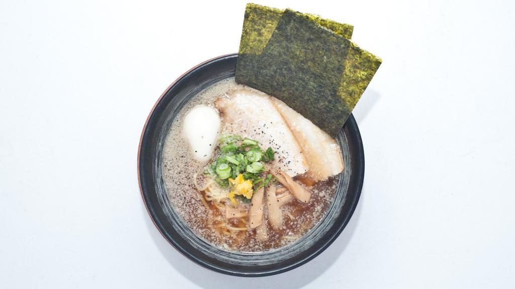 Shoyu Ramen · Thick noodle, chicken and soy sauce broth, egg, pork chashu, bamboo shoots, green onion, seaweed.
