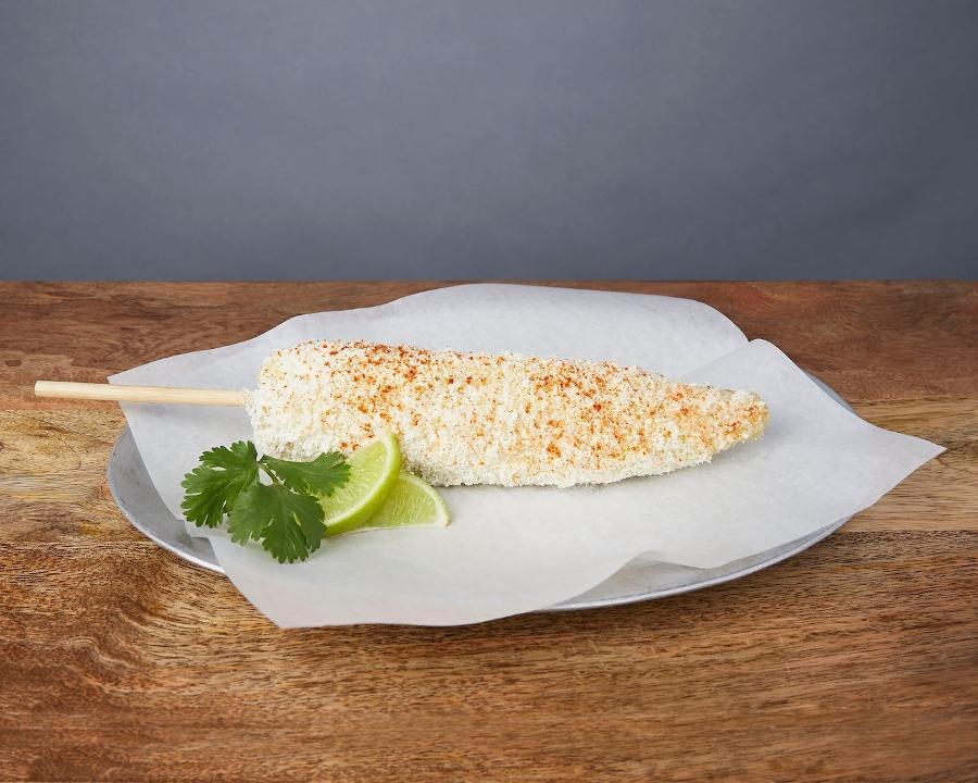 ELOTE  :: · Fresh corn on the cob brushed with lime salsa & dusted with cotija cheese and cayenne pepper