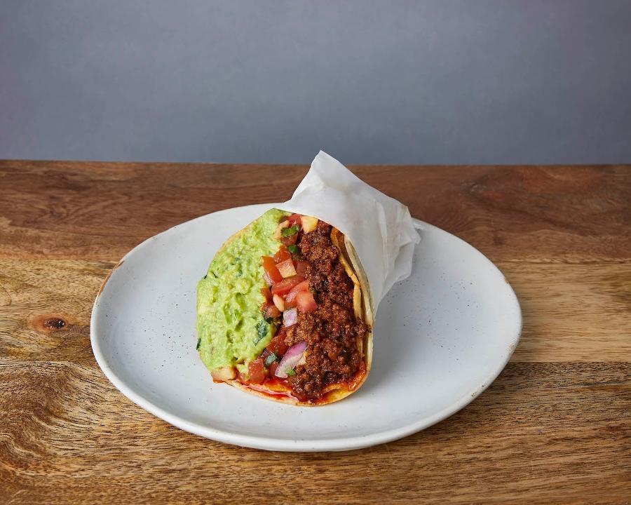 NICK'S WAY CHORIZO :: · One taco with a grilled crispy corn tortilla wrapped in a soft corn tortilla. With Jack cheese, pinto beans, pico de gallo, & guacamole