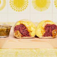 New York Breakfast Burrito · Two scrambled eggs, hash browns, pastrami, caramelized onions, and melted cheese wrapped in ...