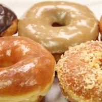 1 Dozen Regular Donuts  · Raised donuts: Raised Glaze, Chocolate,  Maple, Crumble, Sugar.
Old fashioned: Glaze, Chocol...