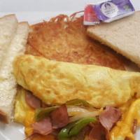 4. Combination Omelette · Ham, bell pepper, onion, served with hash browns and toast, and cheese.