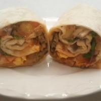14. Meat Burrito · Beef, sausage, ham, bacon or turkey
with hash browns, eggs, cheese, salsa, mayo, ketchup and...