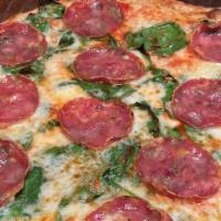 Soppressata Pizza · Tomato sauce, smoked mozzarella, spinach and soppressata.
