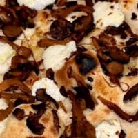 Mushroom Pizza · Sauteed mushrooms, thyme, goat cheese, truffle oil.