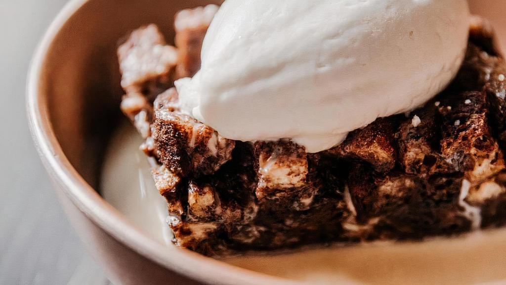Mexican Chocolate Bread Pudding · Grand marnier sauce, fresh whipped cream.
