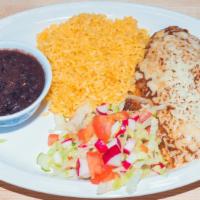 Plato Chiles Rellenos · One chile relleno served with rice beans, salad and hand made tortillas.