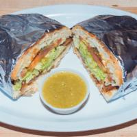 Torta · Lettuce, guac, queso fresco, tomatoes and choice of meat.