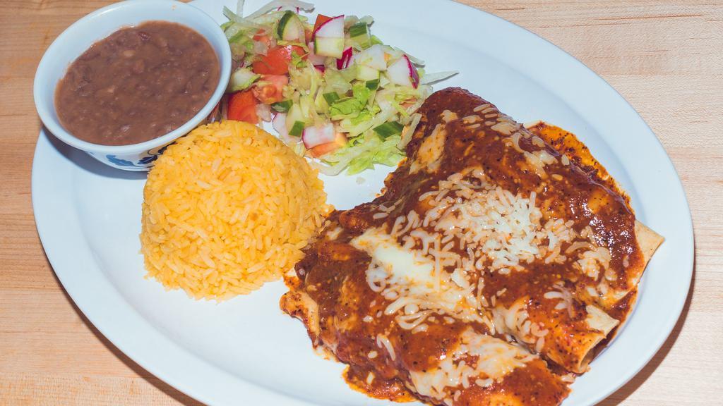 Enchiladas · Beef or chicken served with rice, beans and salada, choice of green or red salsa.