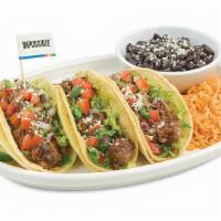 Impossible™ Taco · Warm, soft grilled corn tortillas filled with delicious Impossible meat made from plants top...