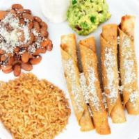 Chicken Taquitos · Four chicken taquitos served with Baja rice, choice of black or pinto beans, sour cream, gua...