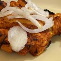 4. Chicken Tandoori Breast · Tender chicken breast marinated with yogurt and spices, baked in tandoor.