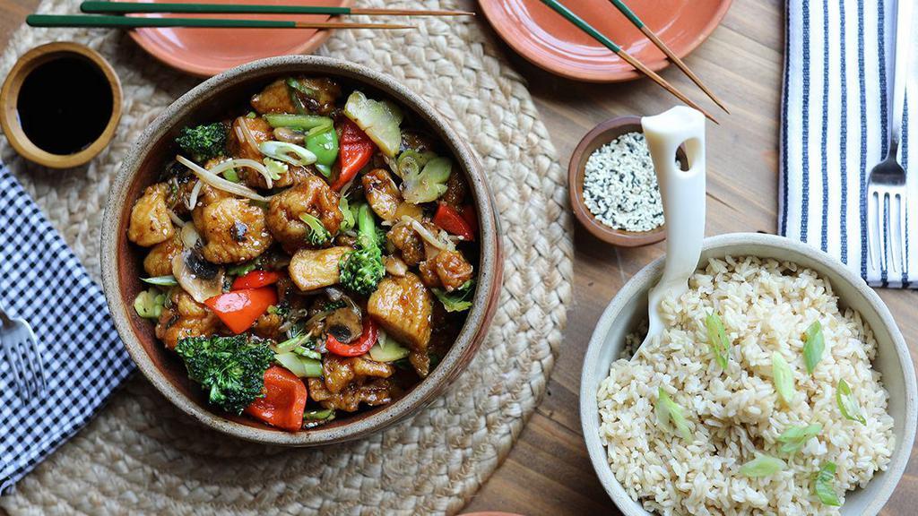Teriyaki Chicken Meal · A family-style serving of our teriyaki chicken wok made with chicken breast, mushrooms, bean sprouts, bell peppers, broccoli, onions, sesame seeds – served with choice of white or brown steamed rice.