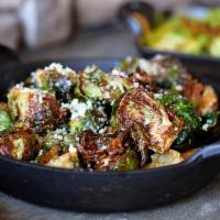 Brussels Sprouts · lemon, garlic, butter, capers, crispy croutons, romano cheese [470 cal] .