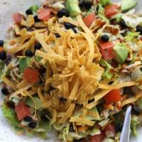 Tex-Mex Salad · chicken breast, black beans, jack, cheddar, sweet corn, avocado, tomatoes, BBQ sauce, hand-c...
