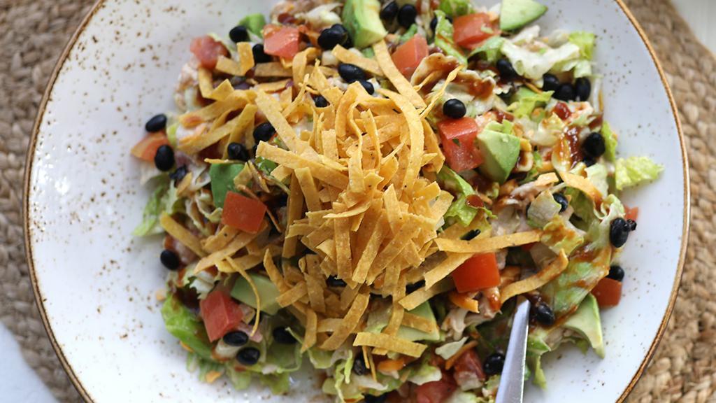 Tex-Mex Salad · chicken breast, black beans, jack, cheddar, sweet corn, avocado, tomatoes, BBQ sauce, hand-cut tortilla strips, chipotle ranch [670 cal] .