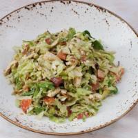 Cobb Salad · shredded chicken breast, tomatoes, avocado, blue cheese crumbles, smoked bacon, hard-boiled ...