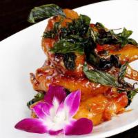 Angel Wing · Fried chicken wings with sweet & sour garlic sauce top with crispy basil.