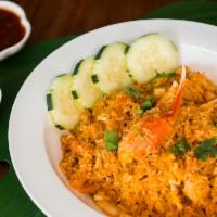 Crab Fried Rice · Crab claws & crab meat, egg, pea, carrot, white & green onion, and cucumber.