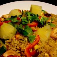 Pineapple Fried Rice Lunch · Pan fried rice with choice of meat, egg, onion, carrot, tomato, garlic, pineapple, raisin, c...