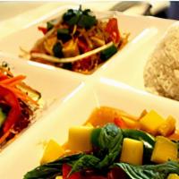 Red Curry Lunch · Red curry with choice of meat, coconut milk, bamboo shoot, carrot, chili, eggplant and basil...