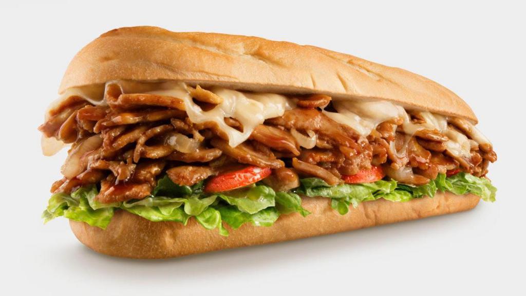 Chicken Teriyaki · The Chicken Teriyaki Cheesesteak: the perfect blend of savory, sweet, and zingy all in one sandwich. This chicken cheesesteak is made with USDA-choice chicken grilled with savory onions and infused with sweet, umami teriyaki sauce. We contrast the sweetness of the teriyaki with a layer of sharp melted Swiss cheese, all served on our signature toasted roll. . All cheesesteaks come with optional creamy mayonnaise, juicy tomato, shredded lettuce, and crispy pickle. . The Chicken Teriyaki Cheesesteak pairs perfectly with Ultimate Fries or a Real-Fruit Blueberry Lemonade..