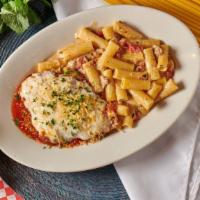 Chicken Parmesan · Baked in a meatless pear tomato sauce with mozzarella. Served with a side of our Rigatoni Bo...
