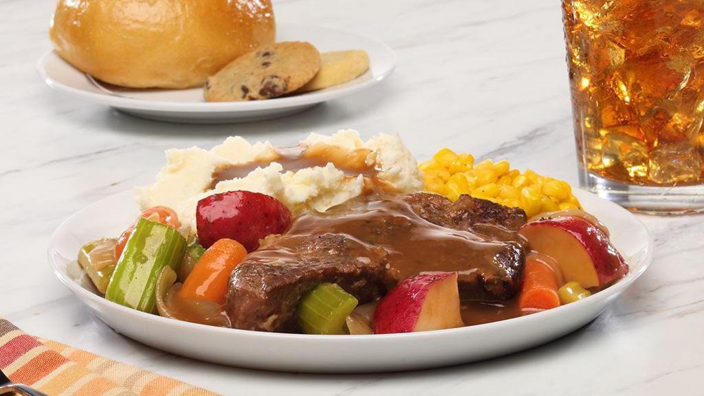 Pot Roast · Our Pot Roast is slow-cooked overnight for awesome tenderness. Served on a bed of potatoes, carrots, onions, celery, and gravy.